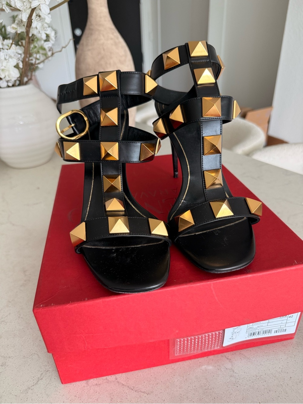 Valentino Garavani Black Leather Studded T-Strap Heels with Gold Pyramids